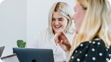 People collaborating on laptops